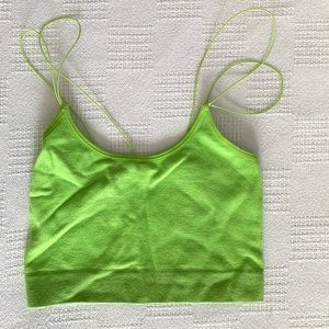 Neon green out from under crop top